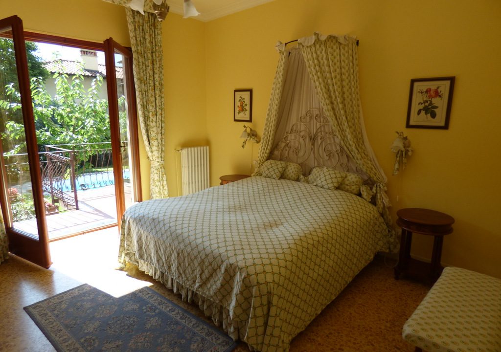 camera da letto Mezzegra - Appartamento in residence con piscina e giardino